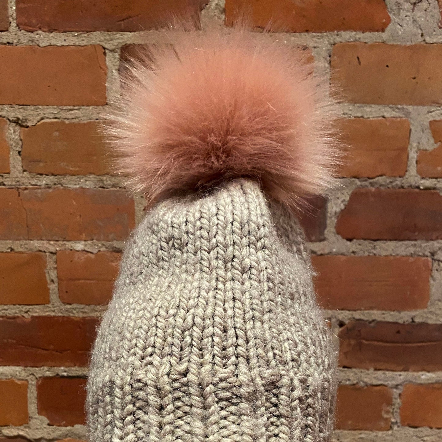 Jumbo Pink Faux Fur pom pom on beige knit hat