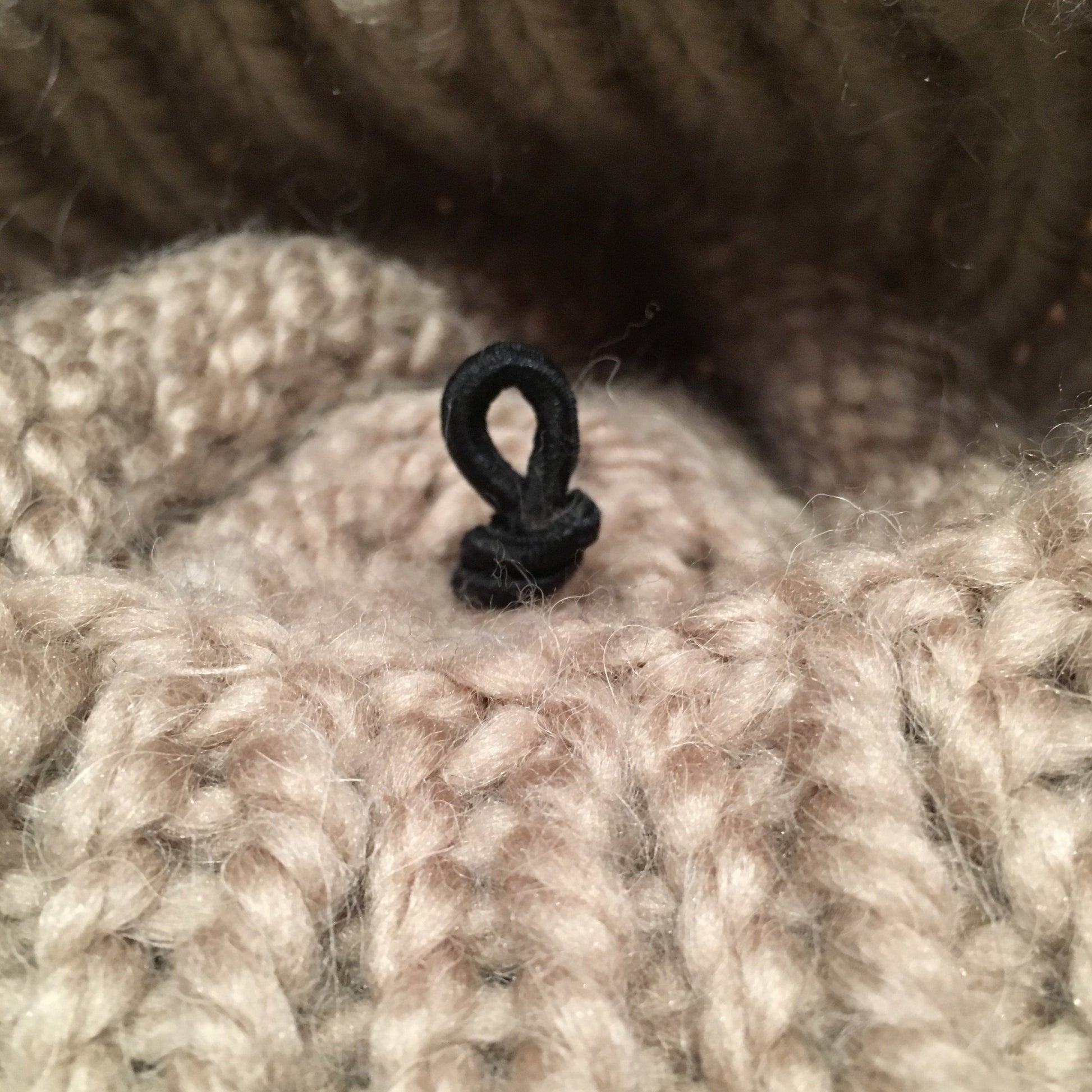 Elastic Attachment for Pom Inside Knit Hat