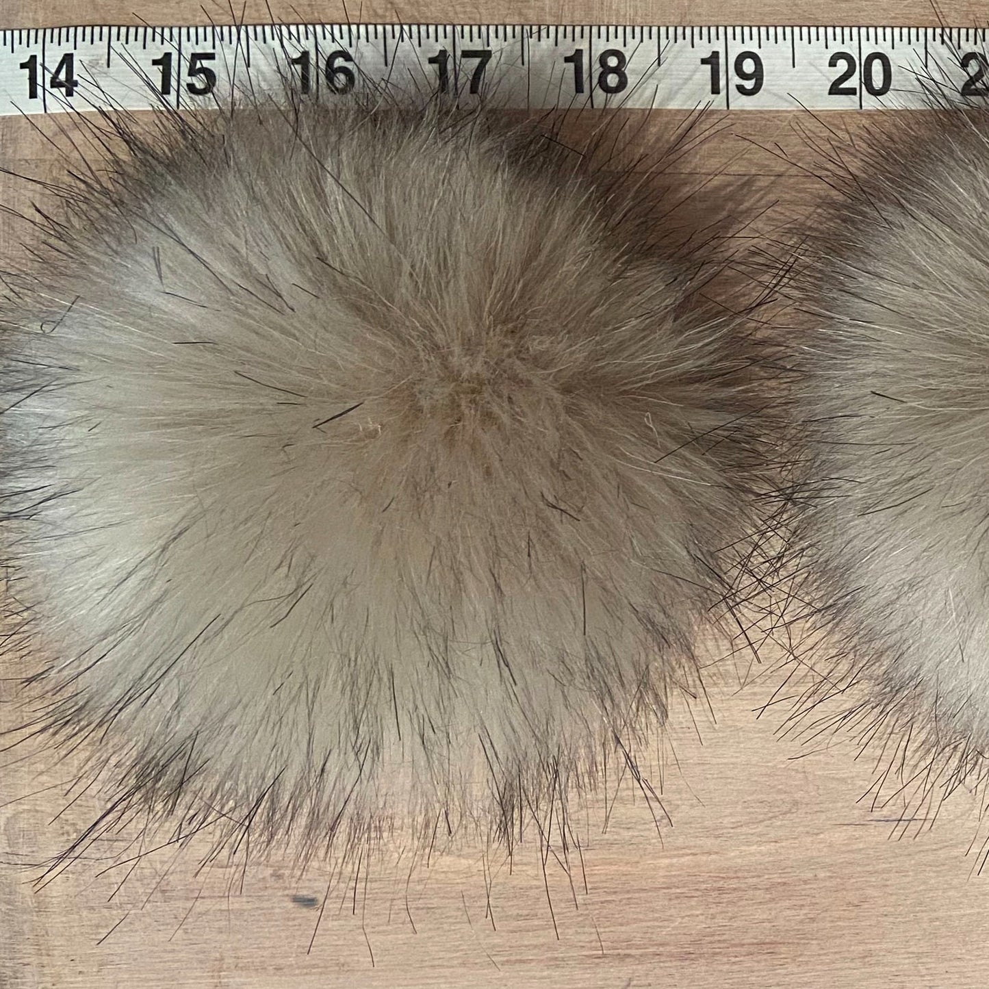 Tape Measurers Showing 4.5 Inch Size of Pom